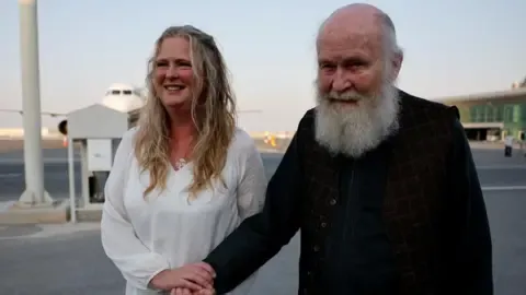 Son of UK Pair Held by Taliban ‘Overjoyed’ as They Return to UK